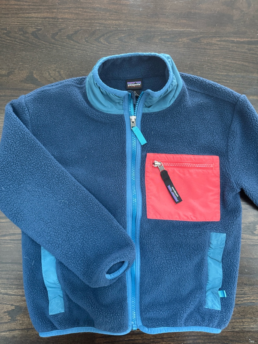 Patagonia Kids Navy Fleece Jacket with Coral Chest Pocket